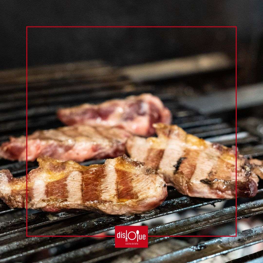 Presa ibérica a la leña