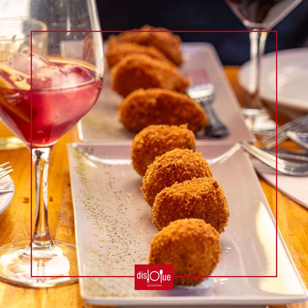 Croquetas de bacalao al pil pil y almendra tostada