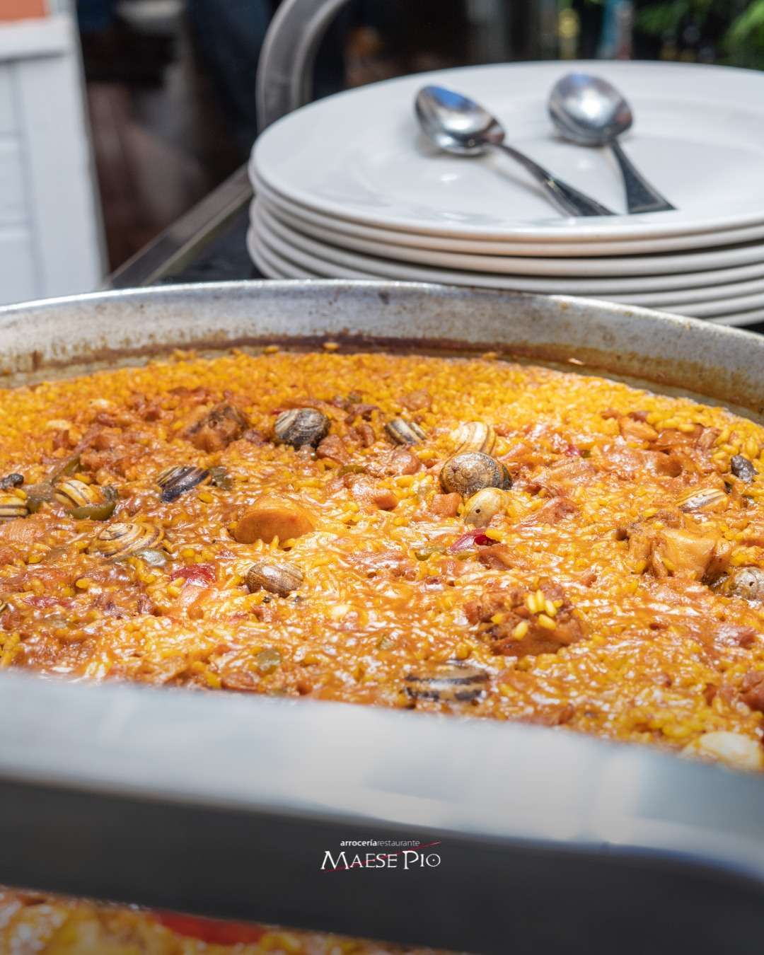 Arroz con conejo y caracoles