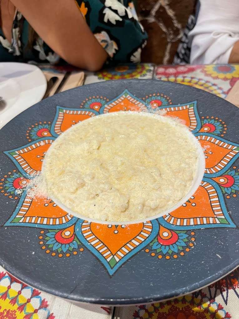 Gnoqui con Langostino, Champiñones y Nata