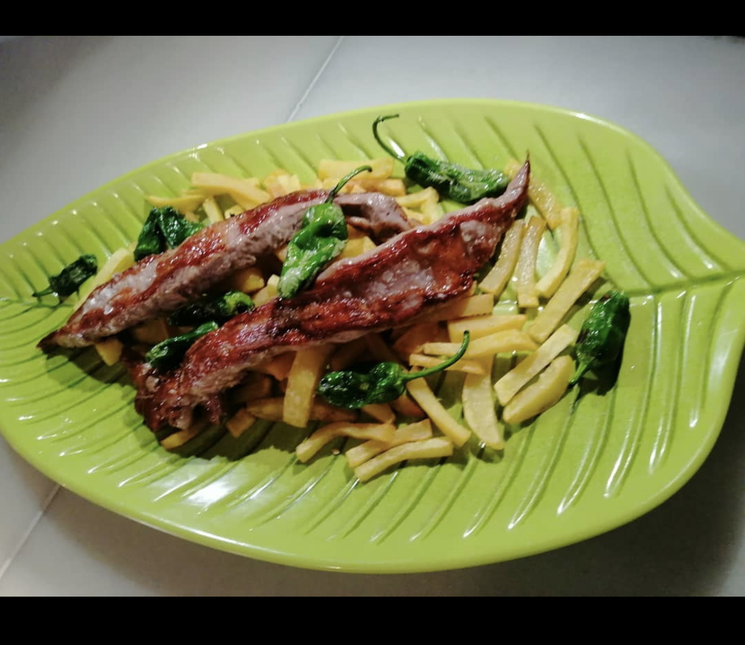 Lagarto ibérico con padroncitos